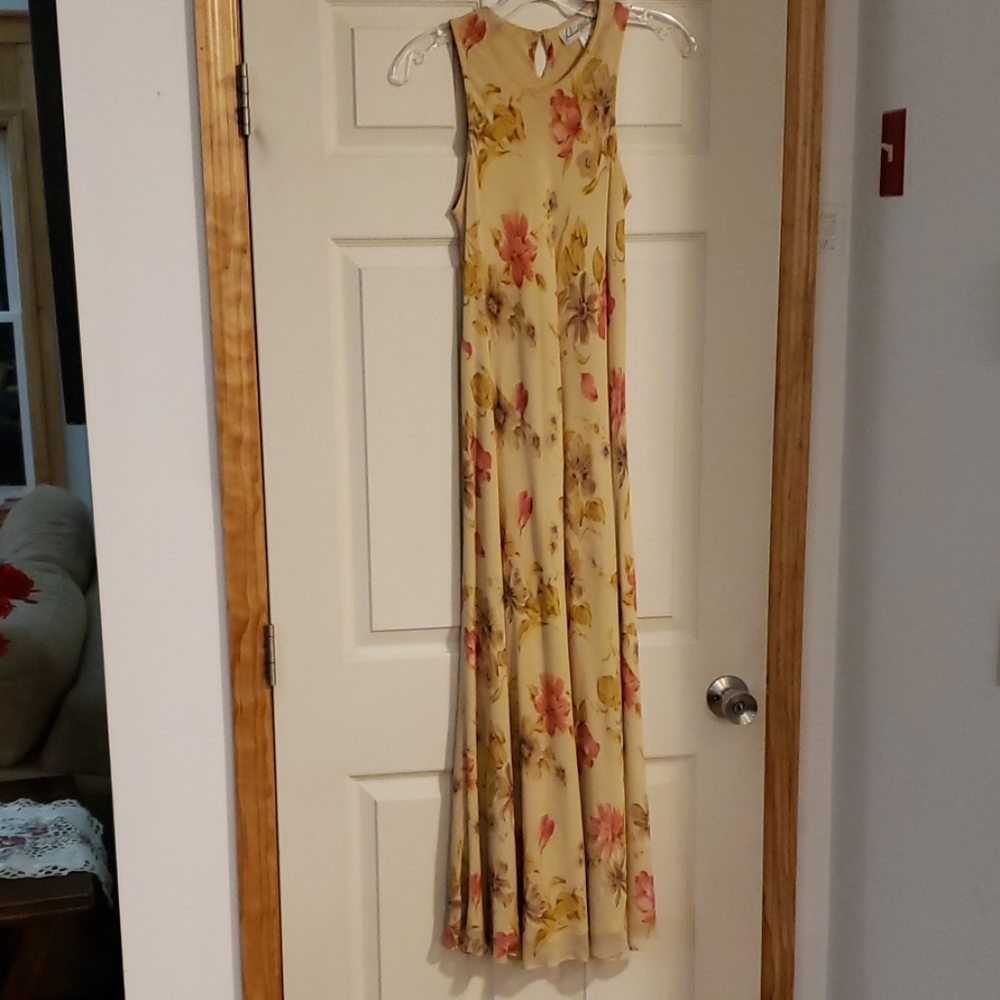 Long cream floral print silk dress.